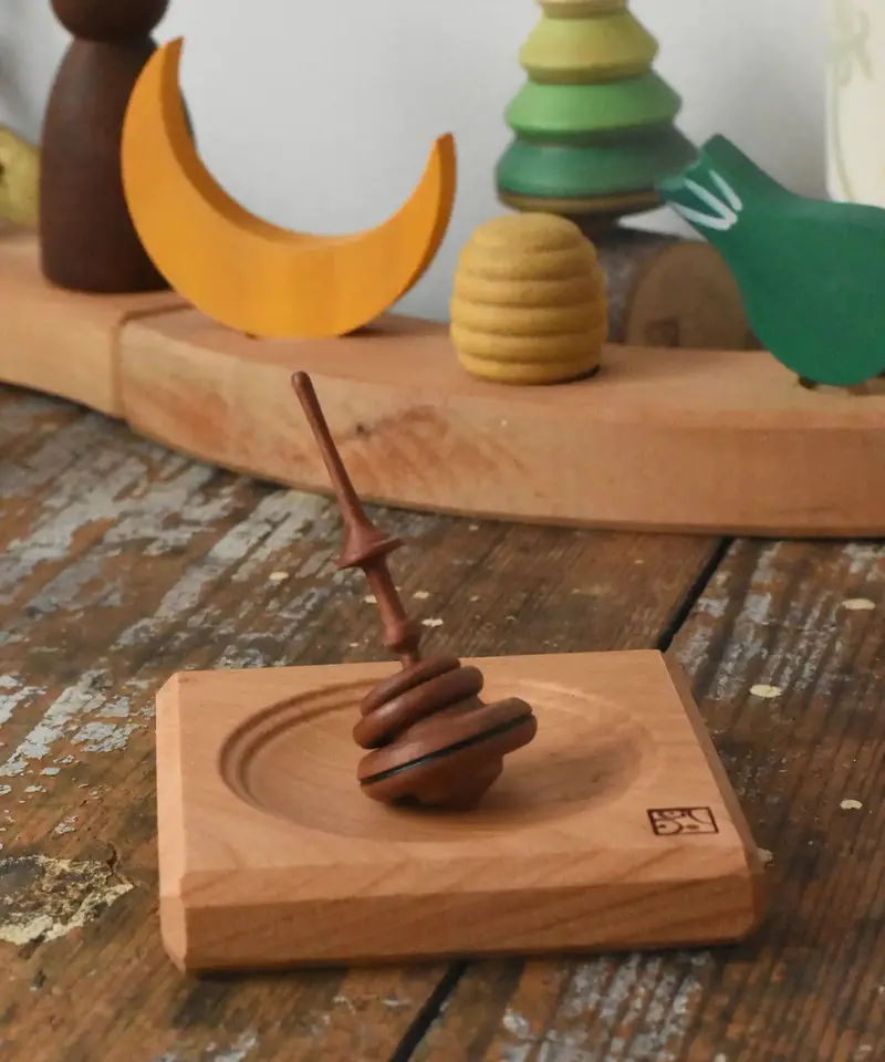 Mader Helene's Captive Rings Small Plum Spinning Top With Mini Board 1